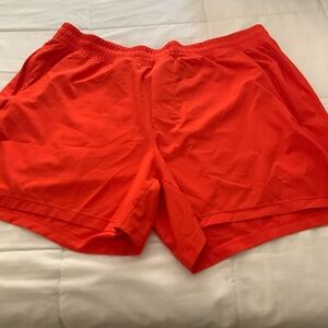 Lululemon 5” orange shorts. Men’s XL